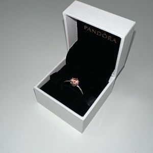 Pink sparkling crown solitaire ring